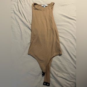 Tan body suit